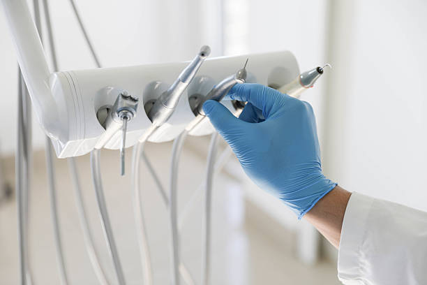 Professional Emergency Dentist technician working in Cedar Crest, MA